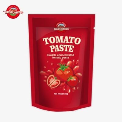 Saco de pé contendo 80 g de pasta de tomate duplamente concentrada, oferecida com níveis de pureza variando de 30% a 100%